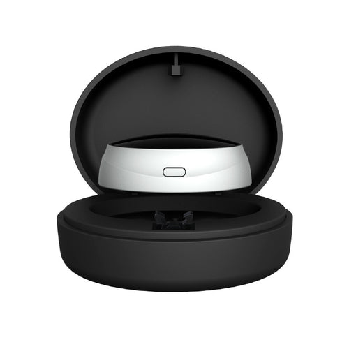 Quietvana anti-snore device in its charging case, front view