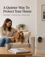 Woman and dog relaxing on a sofa with a Quietvana repeller plugged into the wall nearby