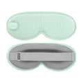 Green 3D heated eye mask on a clean studio background
