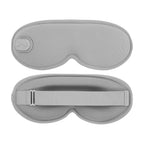 Grey 3D heated eye mask on a clean studio background