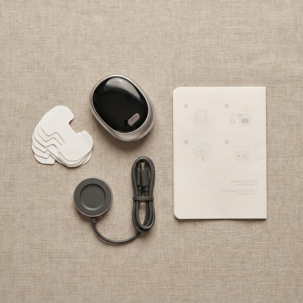 Everything in the Quietvana box: the device, charging case, cable, gel pads and quick-start guide